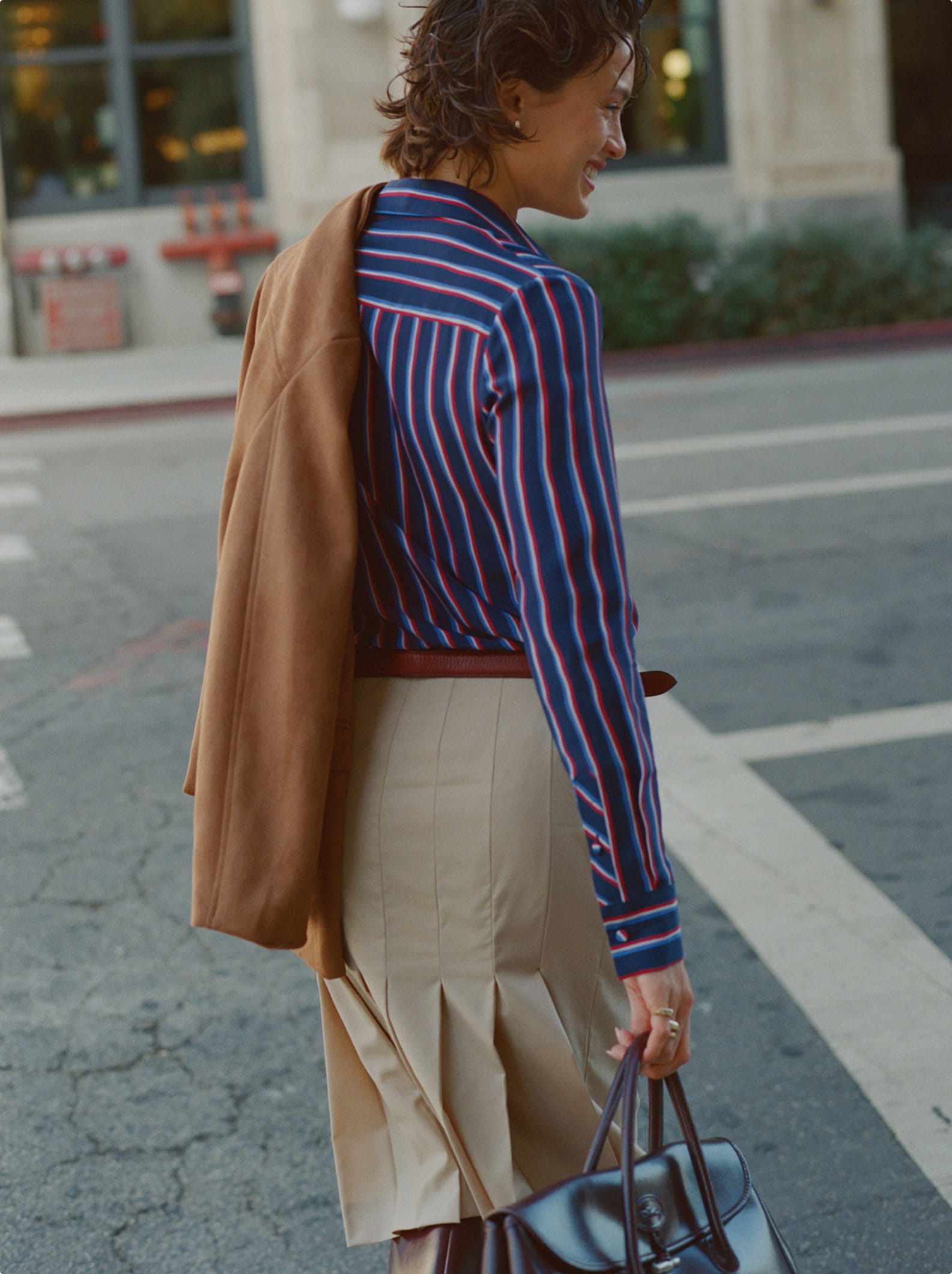 striped shirt and khaki skirt