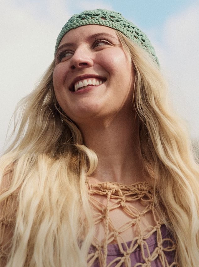 crochet hat on model