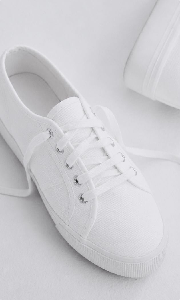 white-soled sneakers