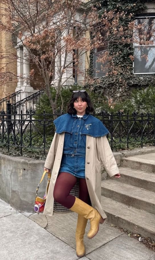 Sofia holding a pink handbag