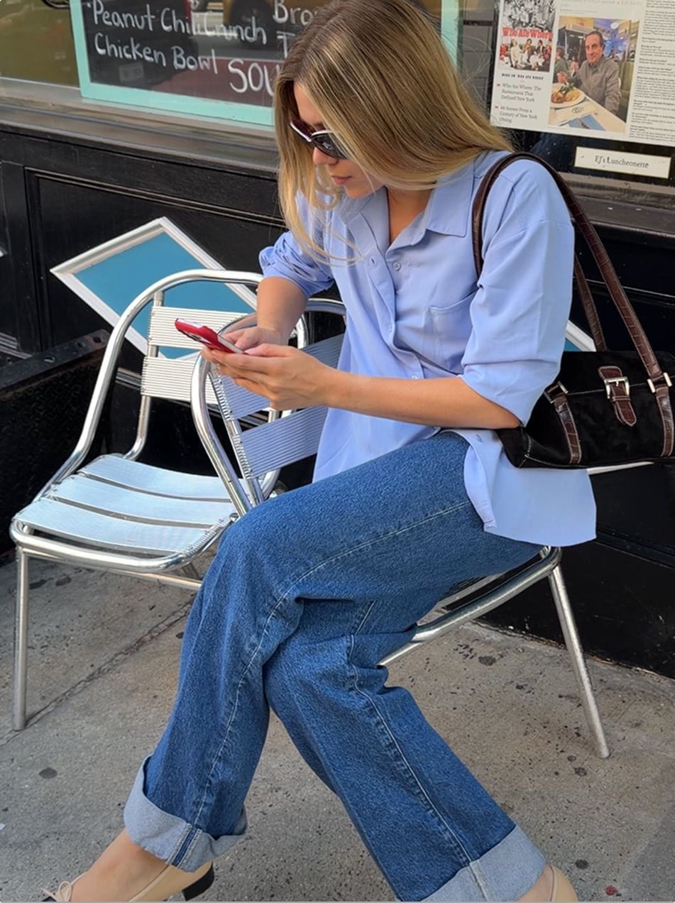 Light blue oversized button-up shirt with rolled sleeves