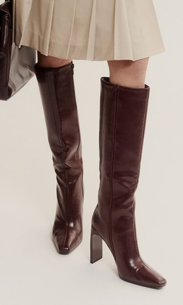 burgundy knee-high heeled boots