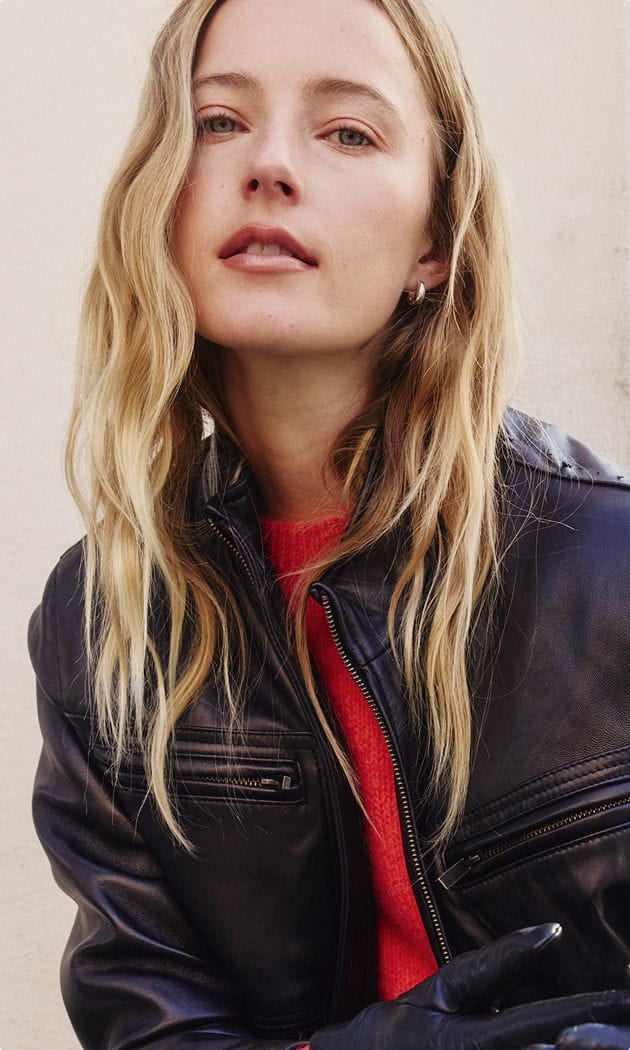 woman in black leather jacket